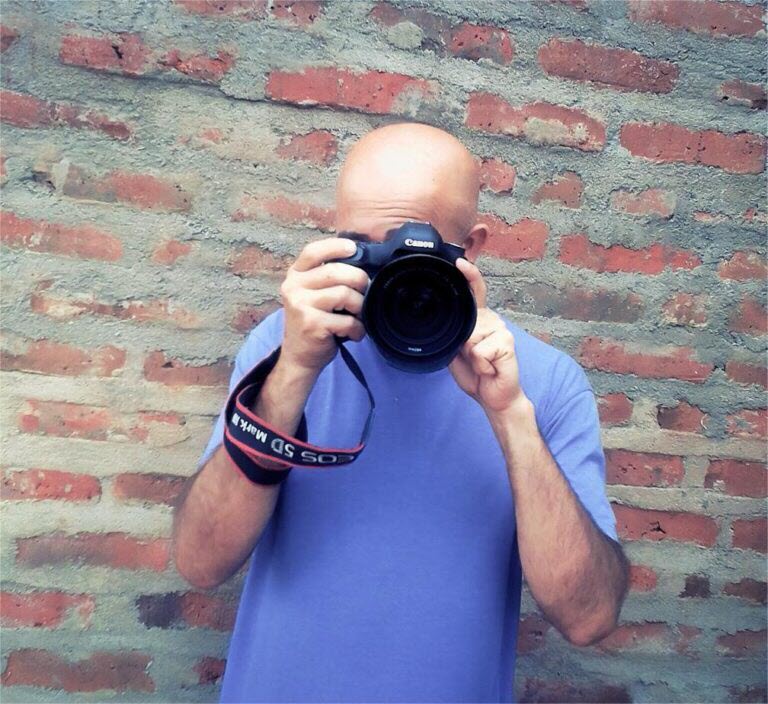 Ukes Baha taking photos with his Canon 5D Mark III camera